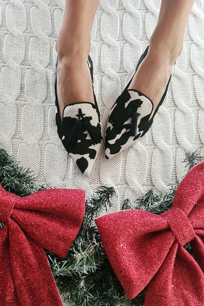COW PRINT LOAFERS WITH TASSEL
